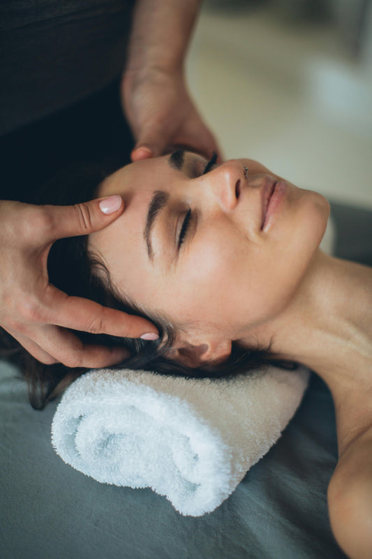 lady enjoying face massage