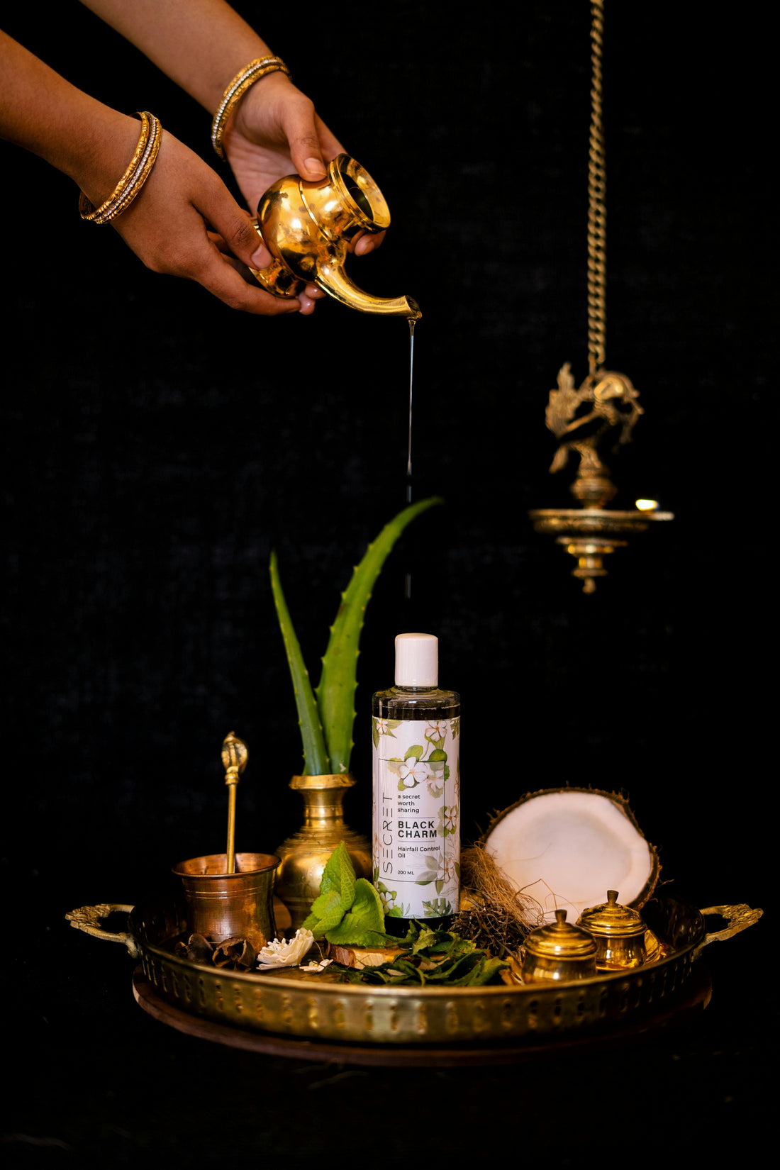 Picture of a shampoo bottle set against a dark background