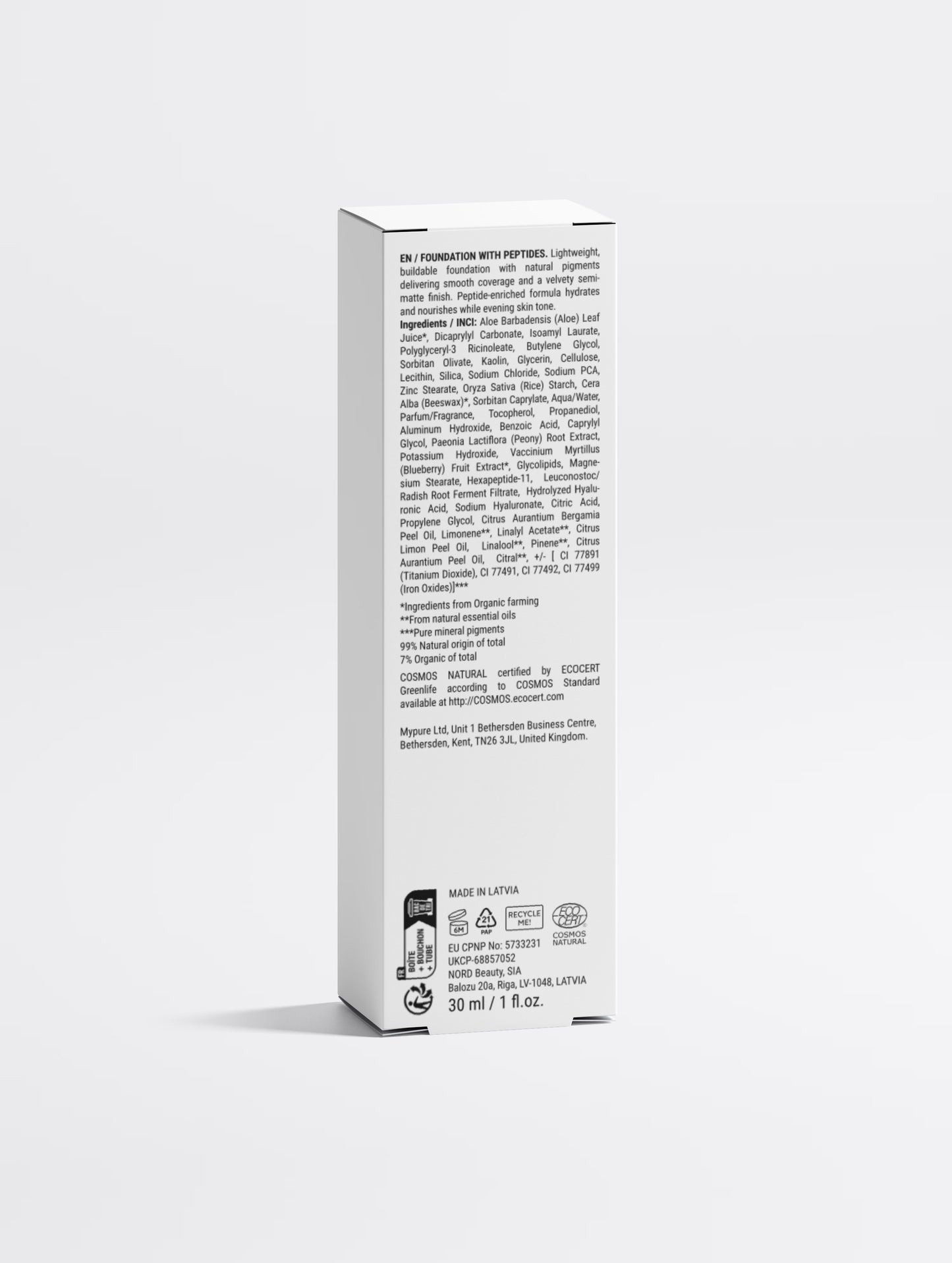 The back of a tall white rectangular product box, showing dense black text, photographed on a clean light gray studio background.