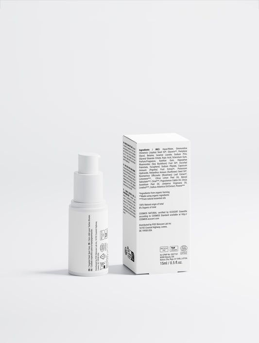White skincare bottle and box on a light gray background