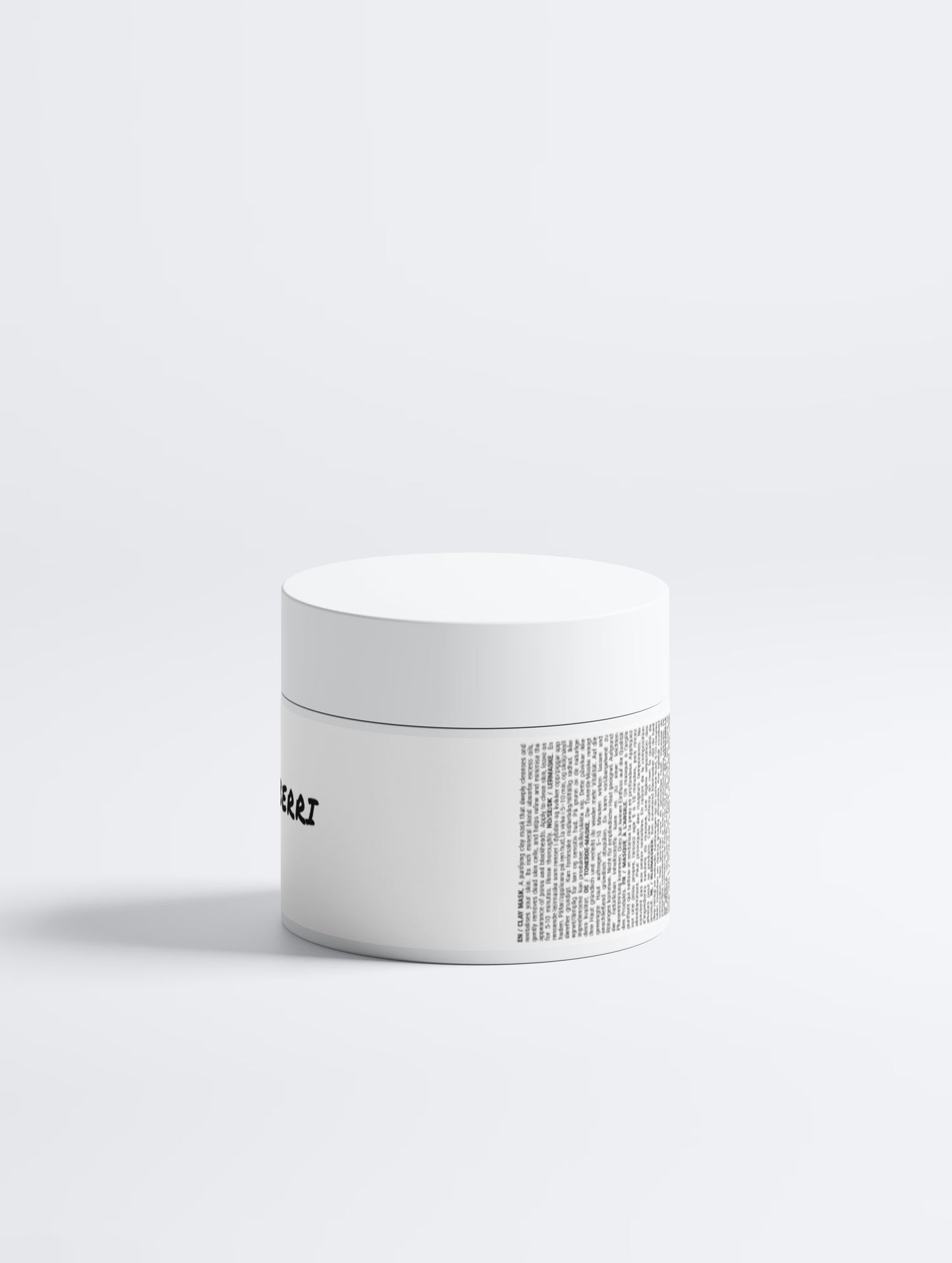 White jar with textured lid on a white background