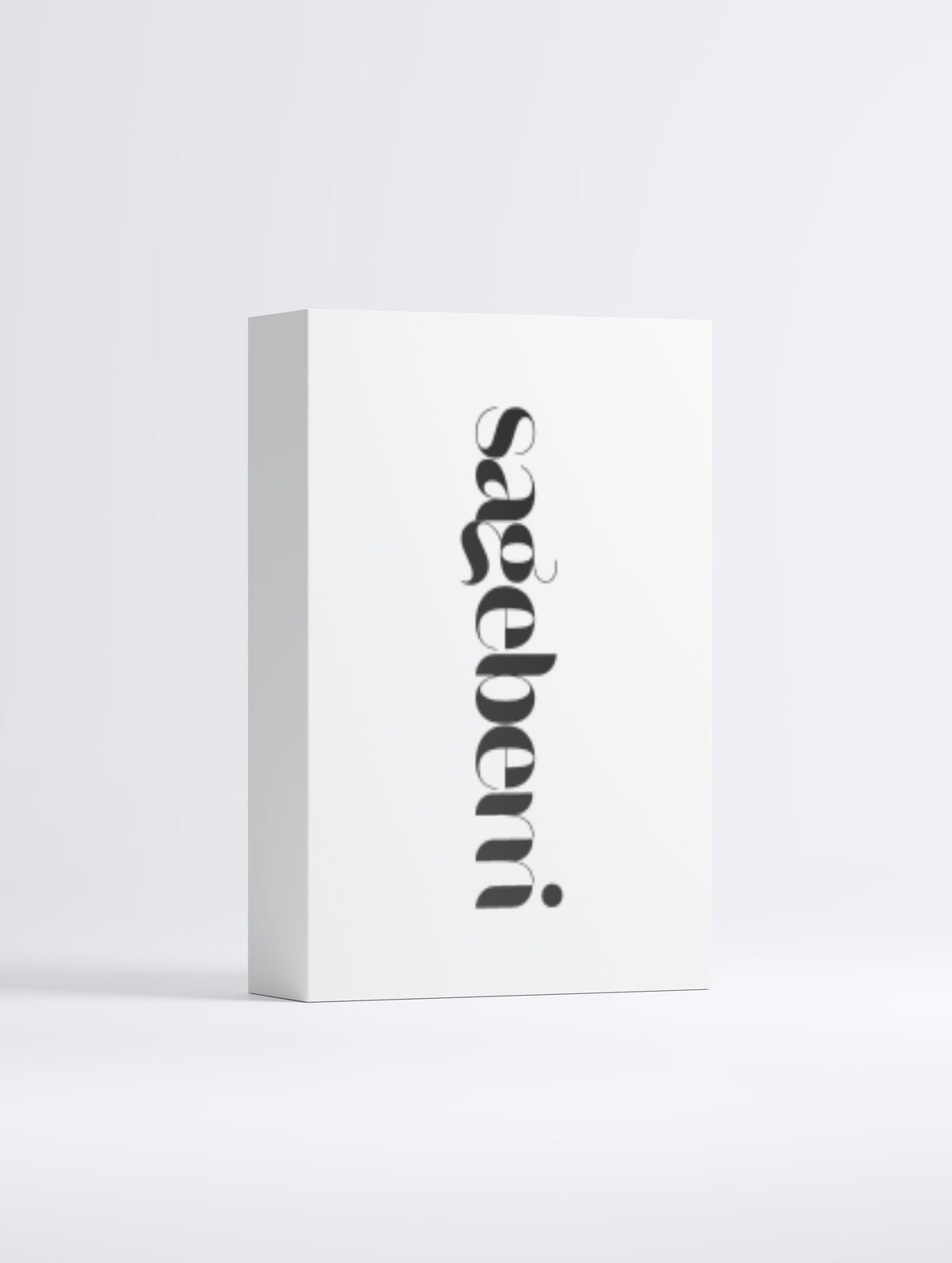 A minimalist white rectangular product box standing upright on a light gray studio background, featuring the brand name 'sæbeleni' printed vertically in black script on the front.
