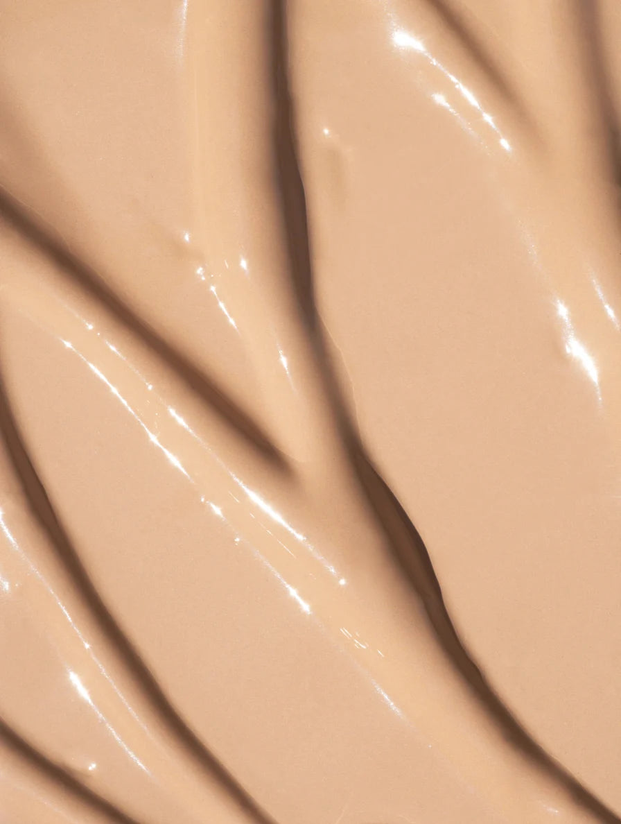 Close-up of beige, glossy fabric texture