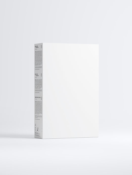 A minimalist white rectangular product box standing upright on a light gray studio background, with small black text visible on the spine.
