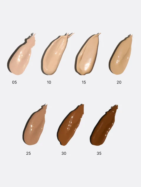Set of cosmetic product swatches with different shades on a light gray background