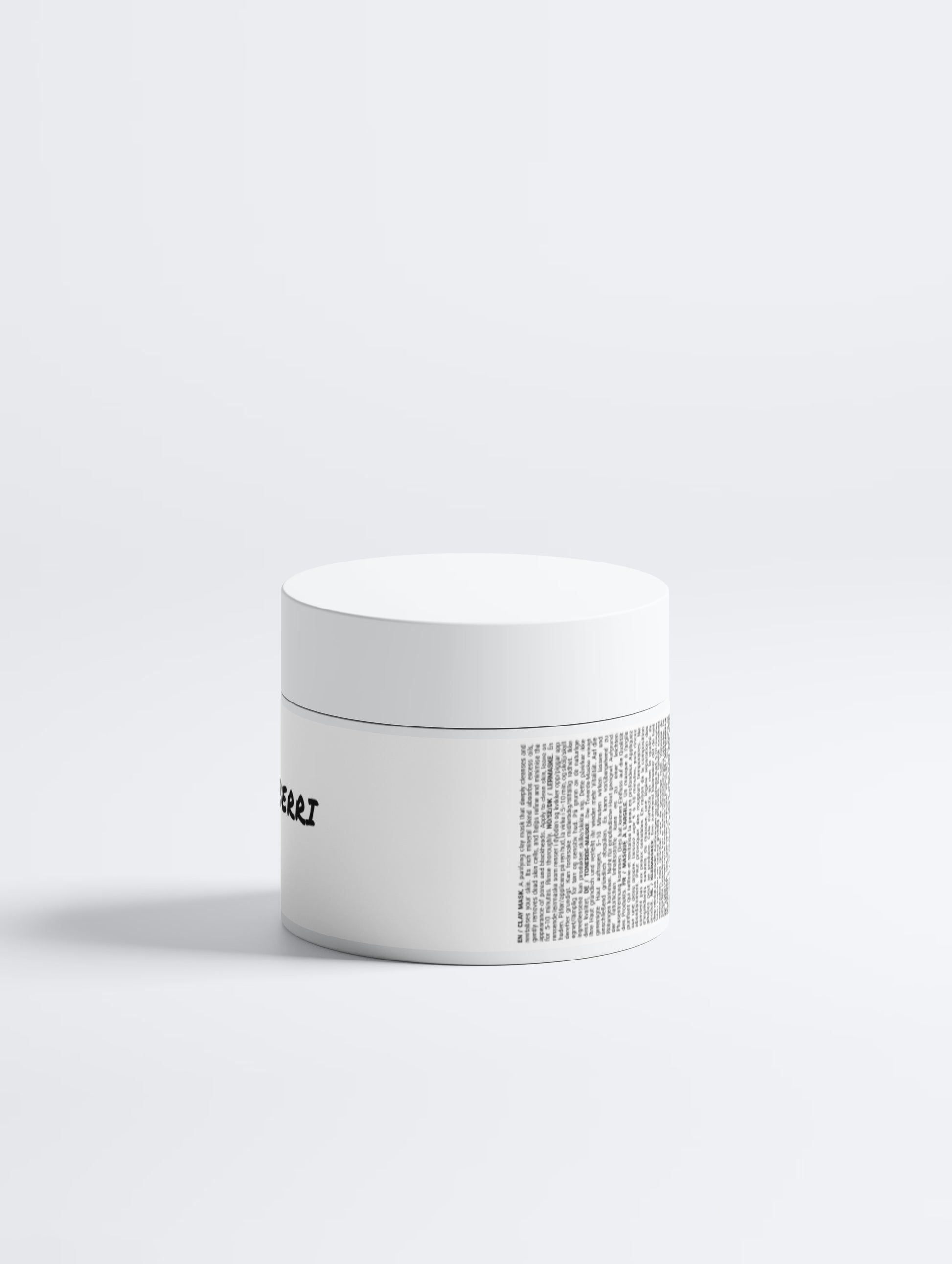 White jar with textured lid on a white background